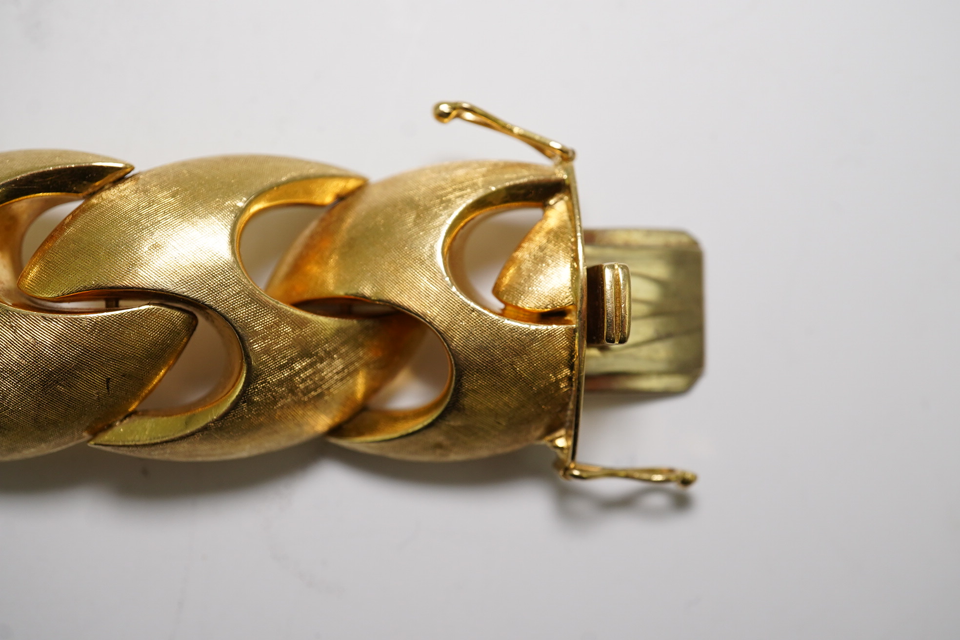 A stylish early 1970's brushed 18ct gold bracelet